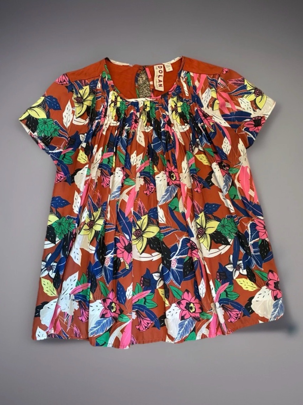 dolan women’s Rust Floral Short Sleeve Peasant Top with Multicolor Blooms